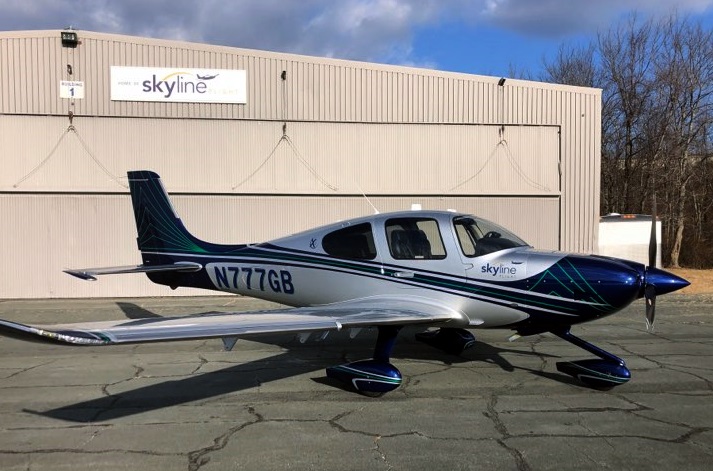 N777GB Skyline Flight SR22 at KFIT hangar